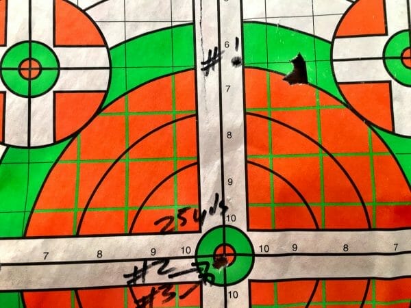 Note the first 25-yard shot landed four inches high. After 64 clicks down, the next two were right on the bullseye. Time to move to 100 yards.