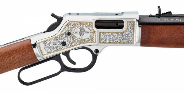 The highly detailed scrollwork engraving on the receivers is surrounded with a 24K gold-filled lasso motif.