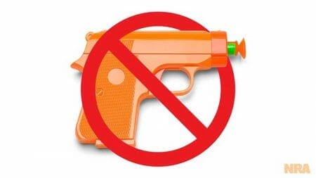 Ban Toy Guns Orange toy dart iStock-Michael Burrell 899732652