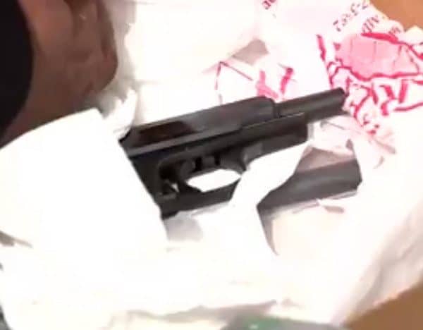 Better footage of the firearm turned in by Darlene shows it was likely a Soviet-era 9X18 Makarov pistol.