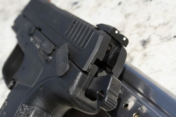 The Springfield Armory XD-E combines double-action / single-action with a traditional safety that locks the hammer. You can carry it hammer down or cocked and locked, but the company recommends hammer down.