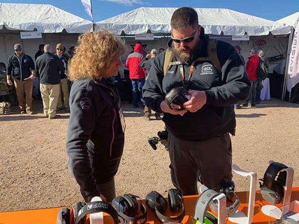 Howard Leight Retail Product Marketing Manager, Mercedes Sune-Weaver, speaks with a representative of the media at SHOT Show Industry Day at the Range.