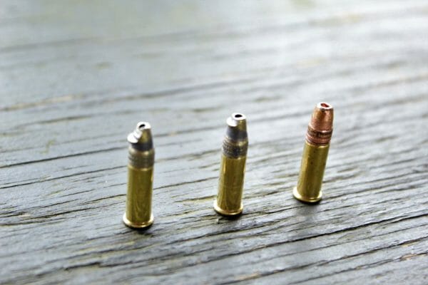 Two Remington Yellow Jackets I pulled from the feed ramp of the Ruger next to a Winchester round for comparison.