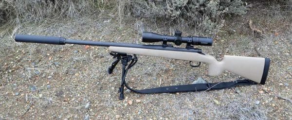 Remington 700 SPS Tactical in McMillan Mc3 Tradition stock with a Suppressor