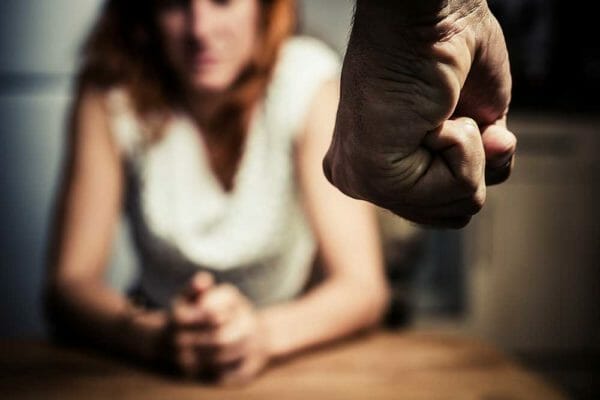 Domestic Abuse Violence Woman in fear of domestic abuse AdobeStock_LoloStock 55703389