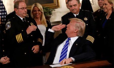 Chuck Canterbury high Fives President Donald Trump