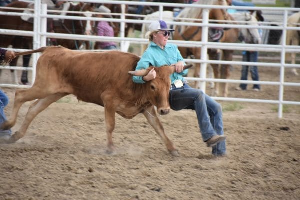 Not only did Hannah Mitchell win the bulldogging buckle but she also won a Smith's Trailbreaker With Firestarter Combo. (Photo by Anne Boswell).