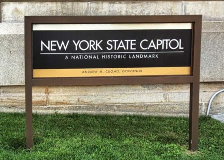 New York State Capitol Sign Andrew Cuomo iStock-599691094