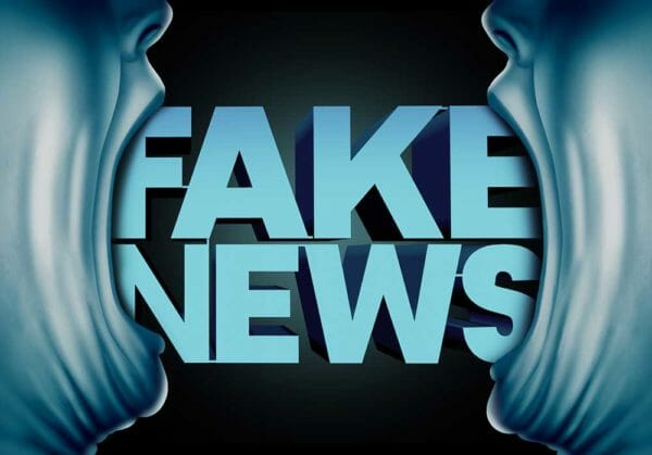 Fake News Biased Media Gun Banners iStock-807078422