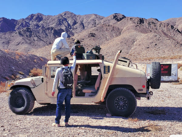 I noticed a Humvee with a Turret set up in the middle of our lanes.