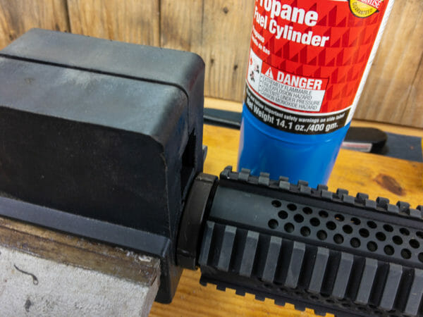 How to Install or Change Your AR Handguard - Featuring the Brownells Wrenchman How to Install or Change Your AR Handguard - Featuring the Brownells Wrenchman: This Rock River handguard was mounted with a counter-rotating locking ring. I had to, umm, blowtorch it a bit, then bash it loose with a hammer and screwdriver. Or you could use an appropriate spanner wrench but I didn't have one.