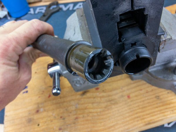 Once you remove the barrel nut, it's easy to give the chamber a thorough cleaning.