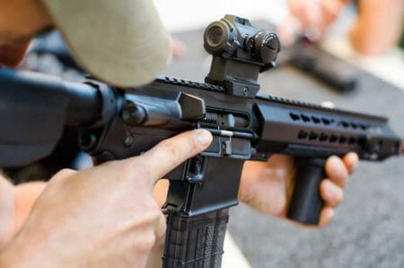 Boyfriend uses AR15 to Defend Self, Girlfriend against Masked Home Invader, artas-iStock-1057969246