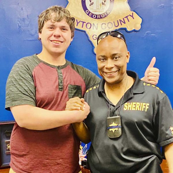 Sheriff Makes Armed Citizen who Survived Gun Battle into Honorary Deputy