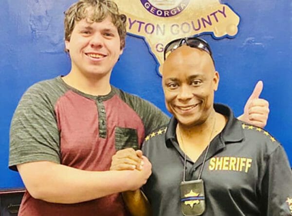 Sheriff Makes Armed Citizen who Survived Gun Battle into Honorary Deputy