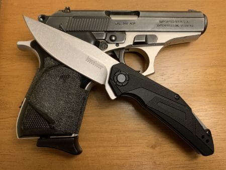 I used the same props in this picture as I did in the Kershaw Airlock photo so you could compare pictures and see the similarities in the two knives (my buddy at Talon Grips will give me grief for taking a picture with some super old grips!).