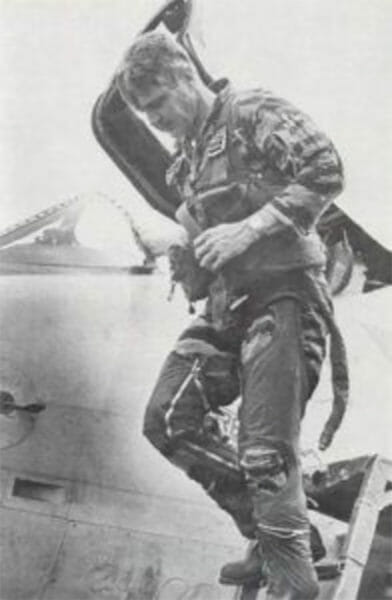 Navy Cmdr. James Stockdale exits an A-4 fighter-bomber weeks before being shot down over Vietnam.