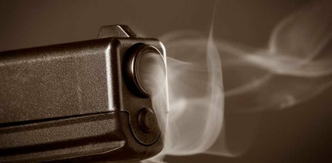 Smoking Gun Barrel Glock iStock-apastron-179258263