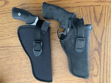 You can see in the top picture how my old holster inadequately covered the trigger as compare to the Blackhawk Hip Holster in the bottom pic.