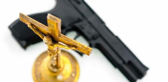 Religion Gun iStock-970957434