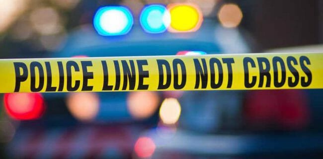 Crime Scene Tape NRA-ILA Police Line shallow depth field image taken yellow Shutterstock 56280433