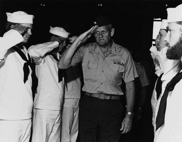 Gen. Louis H. Wilson Jr., the 26th commandant of the Marine Corps, is piped aboard the USS Iwo Jima as he arrives for a visit while the ship was at Marseille, France, July 9, 1978.