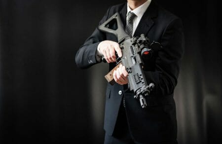 suit gun SIG 550 iStock-1315773645