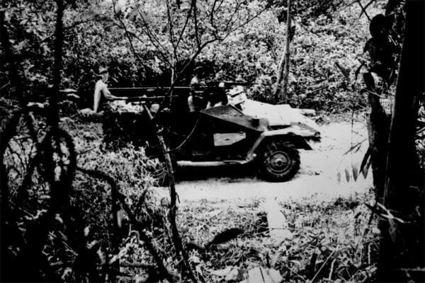 A North Vietnamese armored car moves along the Ho Chi Minh Trail in Cambodia during the Vietnam War.