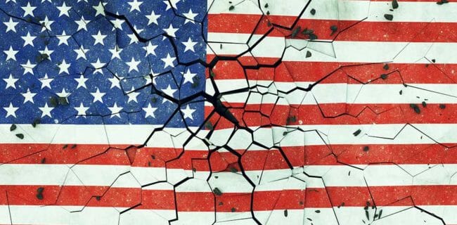 USA Flag Cracked Concrete Constitution Crisis Goverment iStock-Paul Campbell 977454982