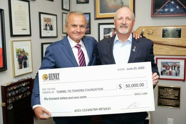 Henry CEO & Founder Anthony Imperato (left) presenting Tunnel to Towers Foundation CEO & Chairman Frank Siller (right) with the first donation of Henry Repeating Arms’ $1,000,000 pledge.