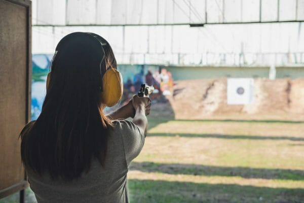 Woman Gun Range iStock 1130399778