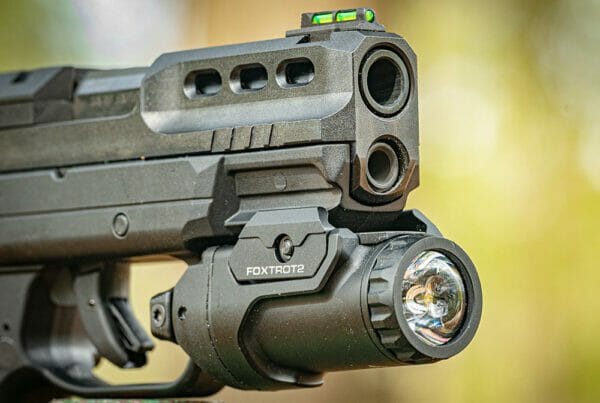 The SIG Foxtrot pistol light fit the Ruger with a slight modification to the inside of the mounting rail.