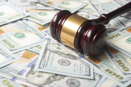 NRA Settles Suits with Ackerman McQueen for $12 Million, iStock-1138499981