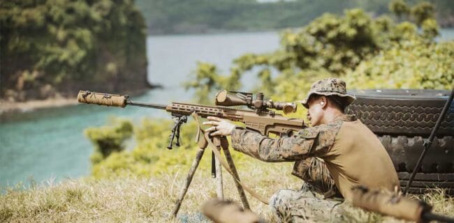 A Marine with the 15th Marine Expeditionary Unit fires a Mk22 Mod 0 in the Philippines, October 2024. (Cpl. Joseph Helms/Marine Corps)
