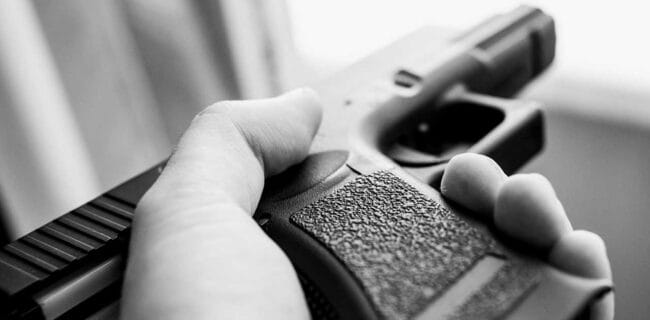 handgun self defense glock pistol iStock-VasilevKirill 1053113926