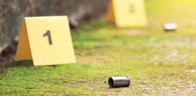 Spent bullet casing iStock-Kumpol Pijadee 2173158947
