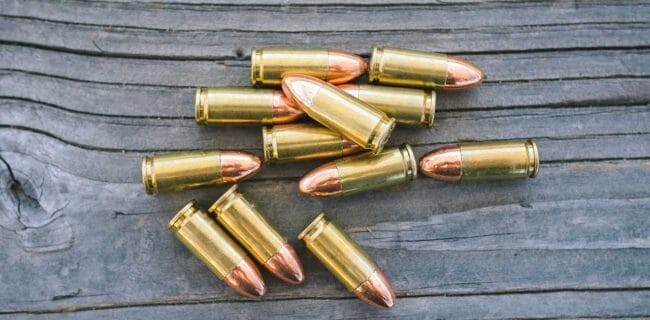 9mm ammunition Bullets on a Table iStock-agil731270693785