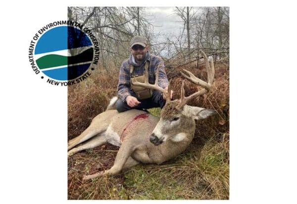 Jayson Zorda poses with deer taken illegally in Erie County