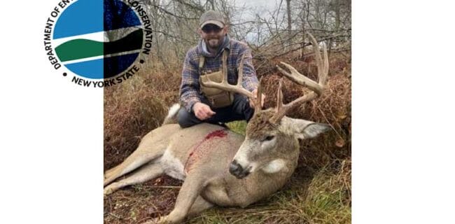 Jayson Zorda poses with deer taken illegally in Erie County