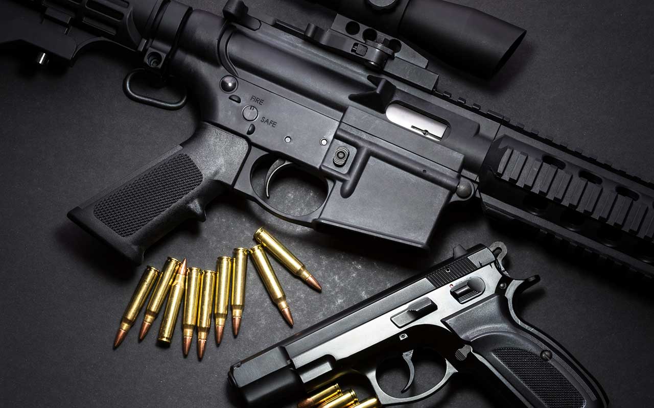 AR15 Semi Automatic Rifle 9mm handgun iStock-MariuszBlach 831433616