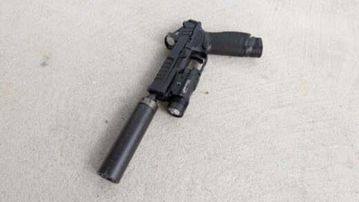Springfield Echelon 9mm handgun equipped with a SilencerCo Spectre 9 Suppressor and a Shield RMSc red dot.