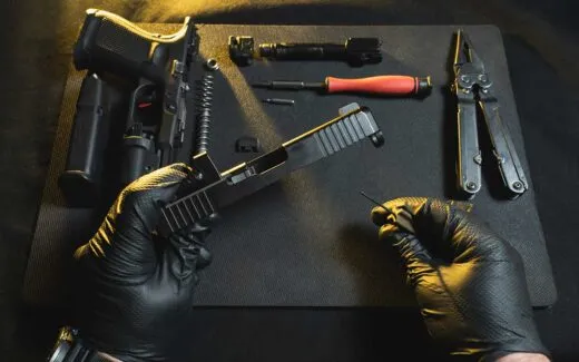 Cleaning and repairing weapons gunsmith gun care iStock-Dmitri Toms 2150995972