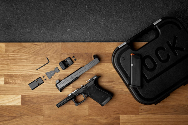 Glock's new optics mounting system will include polymer plates compatible with RMR and DPP footprints.