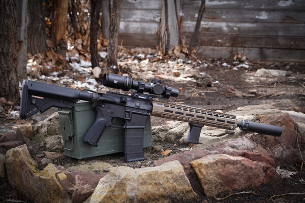 AR-15 with suppressor.