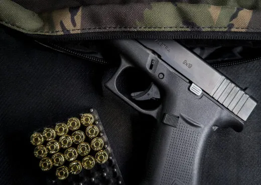 A Glock 48 in camouflage fanny pack
