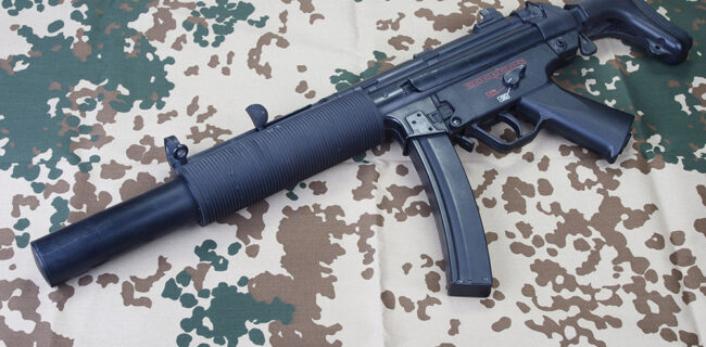 Heckler & Koch MP5 9mm machine gun illustrating the federal Hughes Amendment ban on post-1986 automatic firearms.
