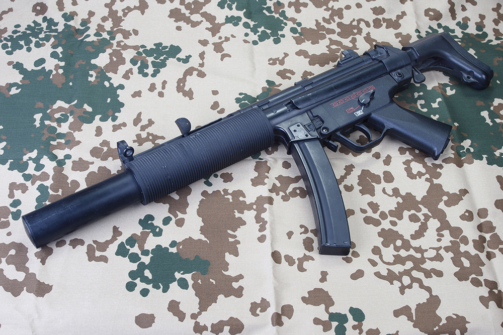Heckler & Koch MP5 9mm machine gun illustrating the federal Hughes Amendment ban on post-1986 automatic firearms.