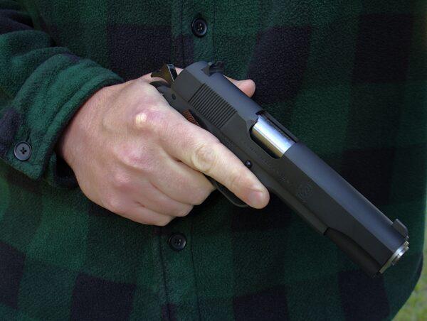 springfield mil-spec pistol in hand