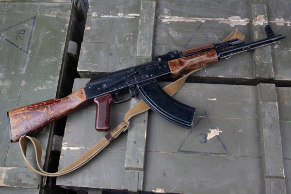 AK-47 Style Rifle on military crates. iStock-2268208078