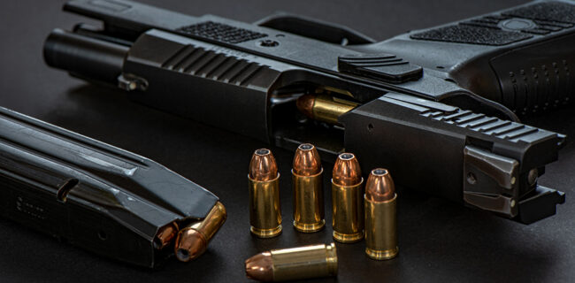 9mm pistol self-defense hollow-point ammo iStock-1899043269